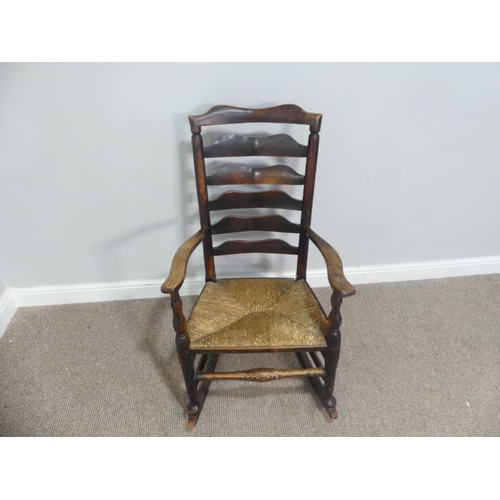 619 - An antique ladder back Rocking Chair, with rush seat, W 54cm x H 97cm x D 62cm, together with an 18t... 