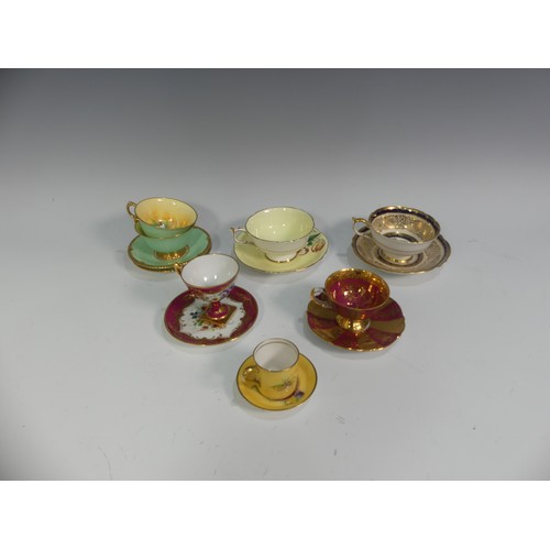 509 - A small quantity of Paragon China Teawares, to include a pair of green and gilt Cups and Saucers, de... 