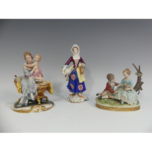 520 - A Capodimonte porcelain figural group of a Mother and Child, modelled sitting on a bed, H 17cm, toge... 