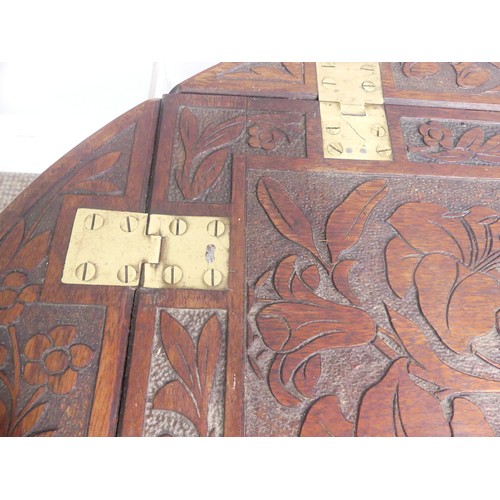 624 - An Arts and Crafts carved oak Butlers Tray, with all over floral motifs, 85cm x 69cm.... 