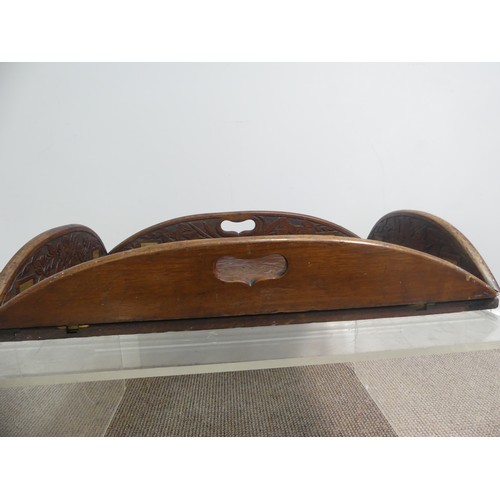 624 - An Arts and Crafts carved oak Butlers Tray, with all over floral motifs, 85cm x 69cm.... 