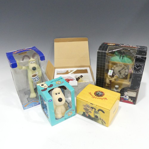 350 - A boxed Wallace & Gromit moving alarm clock, together with a boxed waving Gromit, a coalport cha... 