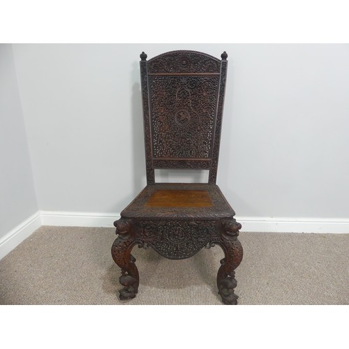 631 - A 19th century ornate Anglo-Indian hardwood side Chair, with all-over intricately carved and pierced... 