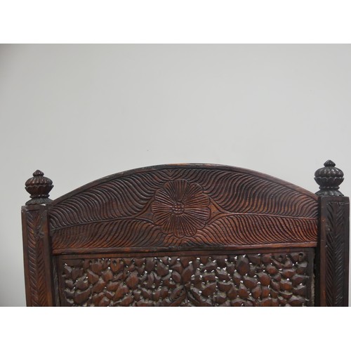 631 - A 19th century ornate Anglo-Indian hardwood side Chair, with all-over intricately carved and pierced... 