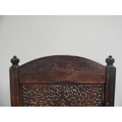 631 - A 19th century ornate Anglo-Indian hardwood side Chair, with all-over intricately carved and pierced... 