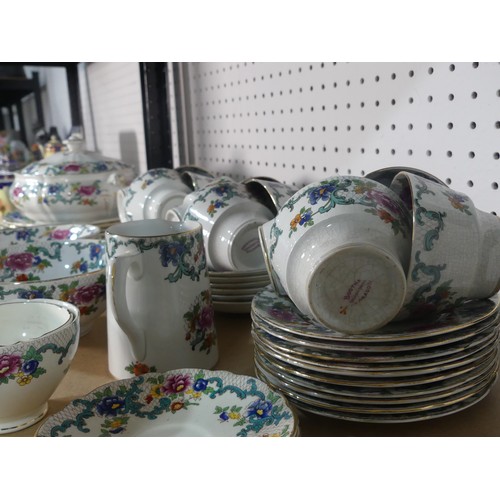 541 - A Victoria China Czechoslovakian 'Desert Scene' pattern part Tea Service, comprising twelve Cups and... 