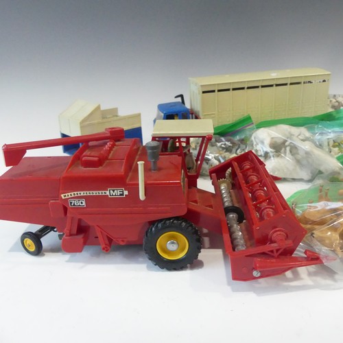 298 - A large collection of Britains plastic farm animals, machinery and accessories, including horses, co... 