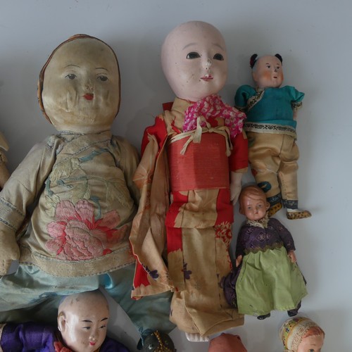 359 - A Collection of costume collectable dolls, including various Japanese dolls, European dolls, Scottis... 