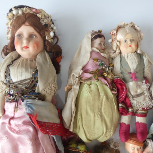 359 - A Collection of costume collectable dolls, including various Japanese dolls, European dolls, Scottis... 