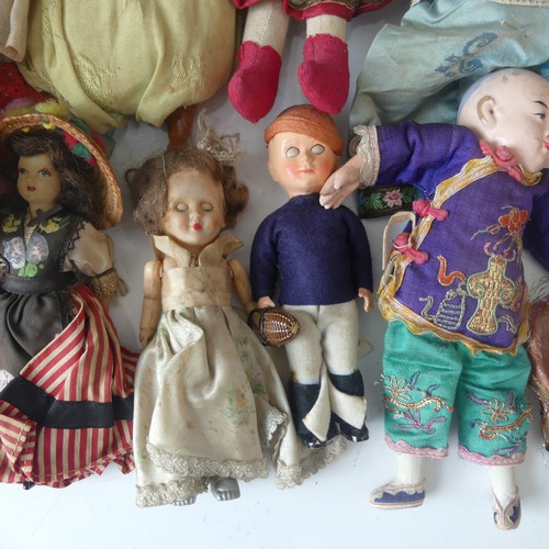 359 - A Collection of costume collectable dolls, including various Japanese dolls, European dolls, Scottis... 