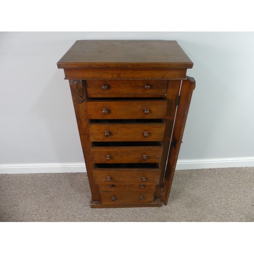 646 - A Victorian oak seven drawer Wellington Chest, with key, W 54.5cm x H 111cm x D 35cm.... 