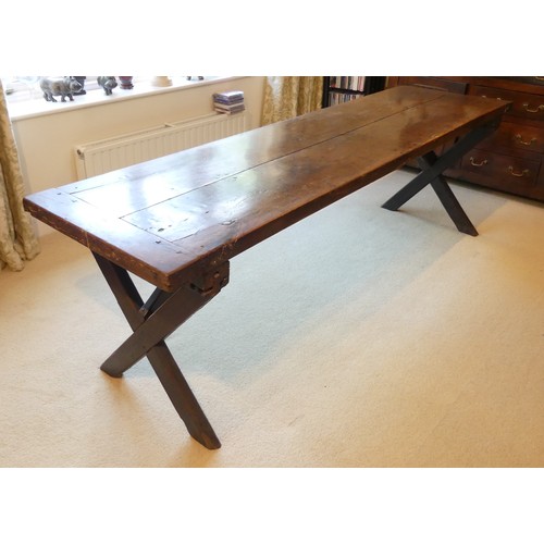 657 - A Georgian oak Refectory Table, the rectangular top above stile feet joined by a stretcher, stretche... 