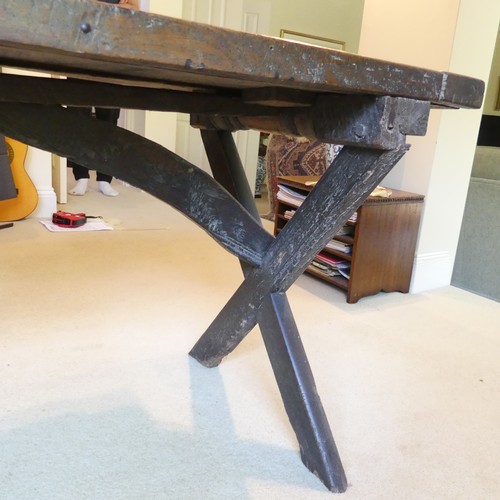 657 - A Georgian oak Refectory Table, the rectangular top above stile feet joined by a stretcher, stretche... 