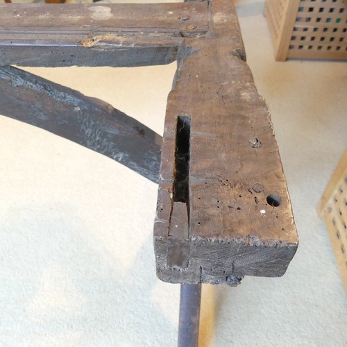 657 - A Georgian oak Refectory Table, the rectangular top above stile feet joined by a stretcher, stretche... 