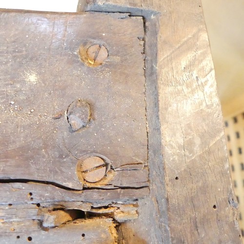 657 - A Georgian oak Refectory Table, the rectangular top above stile feet joined by a stretcher, stretche... 