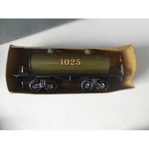 284 - Bing '0' gauge 10/529/0 Petrol Wagon, green, 1025, boxed, and Bing 10/527/0 Barrel Car, green with c... 