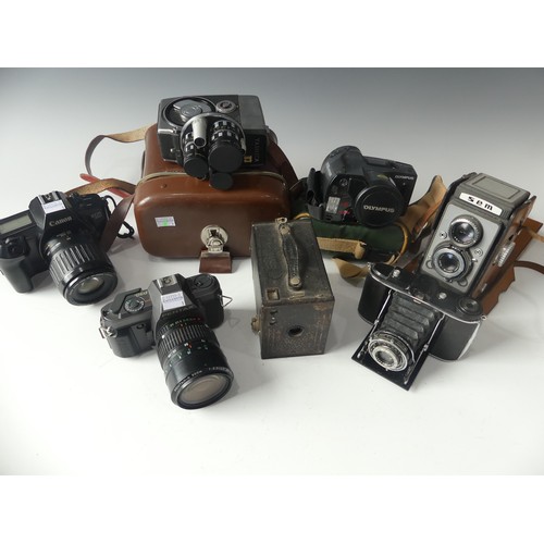 311 - Cameras: ten various vintage cameras, including Pentax MX 35mm SLR with SMC 50mm f1.7 lens and SMC 7... 