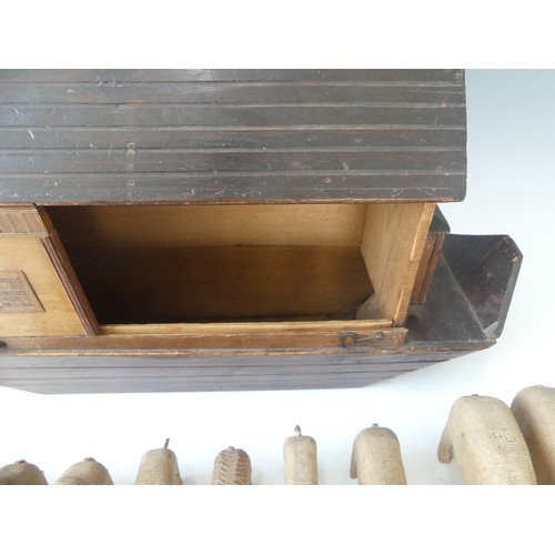 566 - A 1930's/1940's handmade wooden Noah's Ark, with sliding door and catch, together with a large colle... 