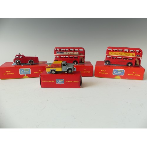 179 - Four boxed Minic Motorways vehicles, including M1550 Fire Engine, M1565 Breakdown Lorry, two boxed d... 