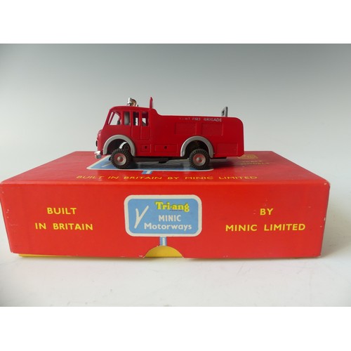 179 - Four boxed Minic Motorways vehicles, including M1550 Fire Engine, M1565 Breakdown Lorry, two boxed d... 