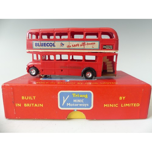 179 - Four boxed Minic Motorways vehicles, including M1550 Fire Engine, M1565 Breakdown Lorry, two boxed d... 