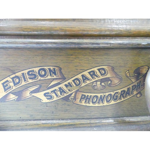 567 - An early 20th century Edison standard phonograph, oak case, brass horn, serial 194199 together with ... 