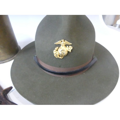 405 - A quantity of Militaria, including a French Commando's Marine Hat Badge, marked on the reverse A.B. ... 