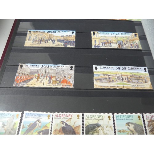 446 - Stamps; 1969-2016 unmounted mint collection of Stamps from Guernsey, Jersey and Alderney, in seven s... 