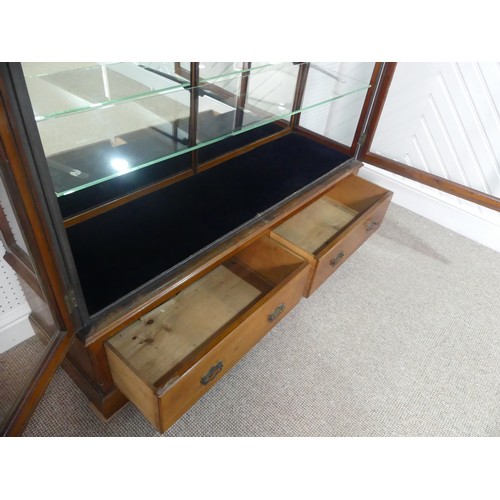 670 - An Edwardian oak framed and glazed commercial Shop Display Unit, with mirrored back and double doors... 