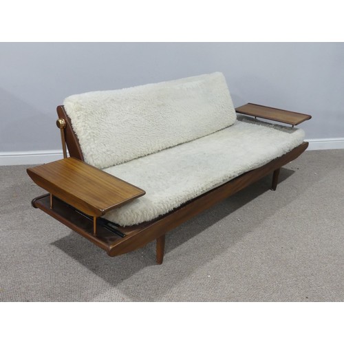 672 - A mid 20thC Toothill Danish style Afromosia teak Day Bed/ Sofa, with a flip over back and flanked by... 