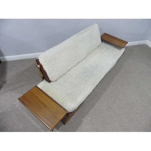 672 - A mid 20thC Toothill Danish style Afromosia teak Day Bed/ Sofa, with a flip over back and flanked by... 