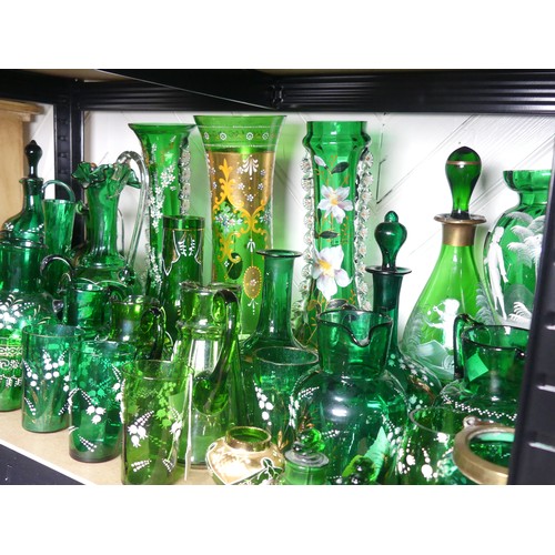 526 - A Mary Gregory Bristol green glass Decanter, together with a Vase with similar decoration and a quan... 