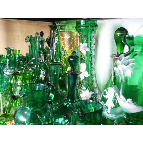 526 - A Mary Gregory Bristol green glass Decanter, together with a Vase with similar decoration and a quan... 