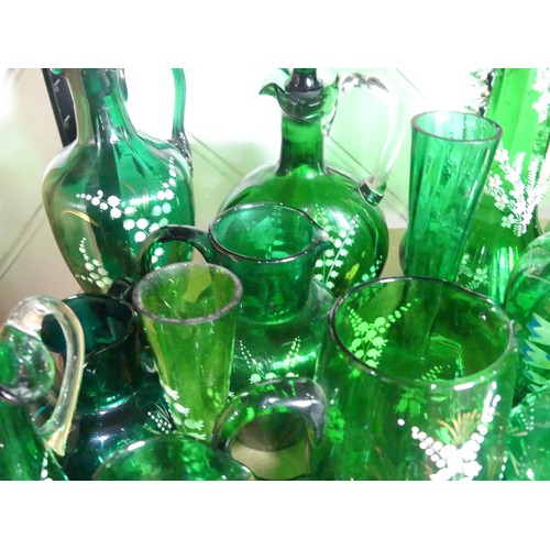 526 - A Mary Gregory Bristol green glass Decanter, together with a Vase with similar decoration and a quan... 