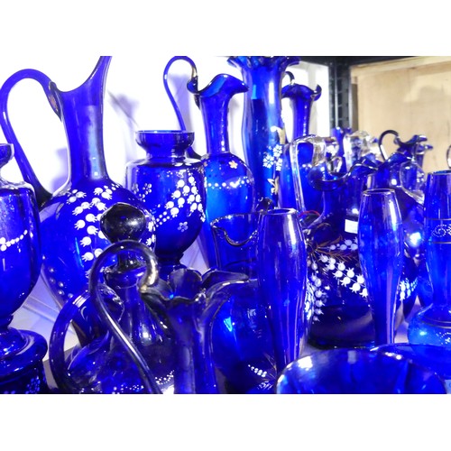 527 - A quantity of late 19thC Bristol blue Glassware, to include gilt and floral decorated Vases, Beakers... 