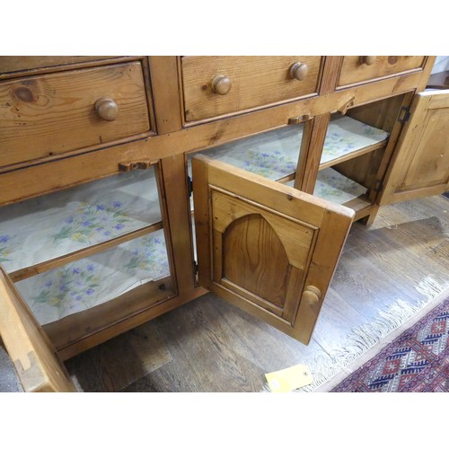 674 - A vintage pine Sideboard, the rectangular top above three frieze drawers and three cupboards below, ... 