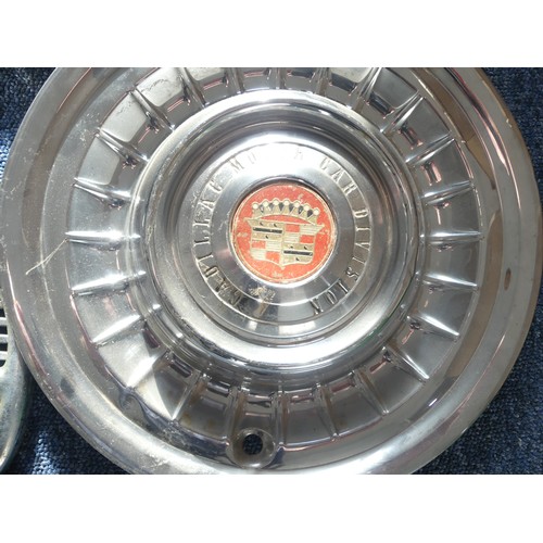 153 - A 1950's Cadillac motorcar hub cap, marked in center 