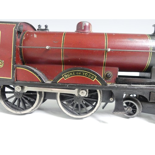 281 - Bassett-Lowke '0' gauge 1927 4-4-0 locomotive and tender, clockwork, red and black lined in yellow.... 