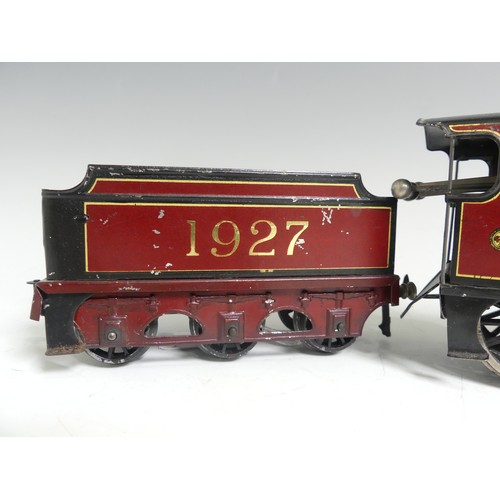 281 - Bassett-Lowke '0' gauge 1927 4-4-0 locomotive and tender, clockwork, red and black lined in yellow.... 