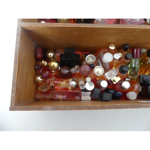 303 - A large collection of Perfume Miniatures, including Givenchy, Dior, YSL, Chanel etc., approx 200, so... 