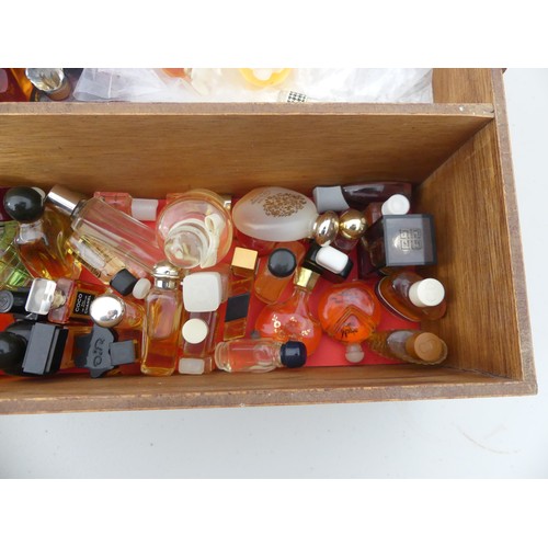 303 - A large collection of Perfume Miniatures, including Givenchy, Dior, YSL, Chanel etc., approx 200, so... 