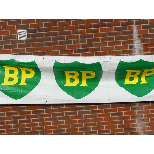 315 - A collection of BP flags and banners, including a BP Race 