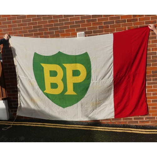 315 - A collection of BP flags and banners, including a BP Race 