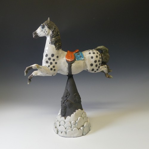 66 - Lawson E. Rudge (b. 1936), a raku fired studio pottery sculpture of a Carousel Horse, numbered 5 on ... 