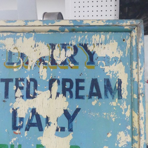 302A - Lynton Dairy: a vintage painted wood advertising sign for Lynton Dairy Fresh Clotted Cream, in poor ... 