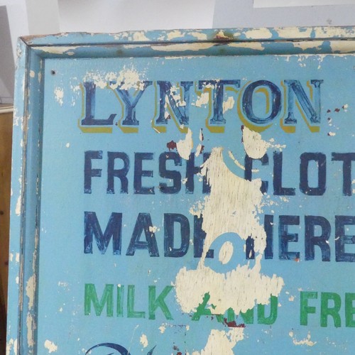 302A - Lynton Dairy: a vintage painted wood advertising sign for Lynton Dairy Fresh Clotted Cream, in poor ... 