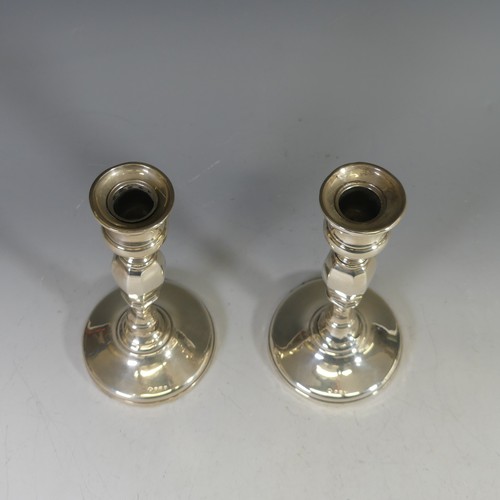 14 - A pair of George V silver Candlesticks, by Adie Brothers Ltd., hallmarked Birmingham, 1927, with a k... 