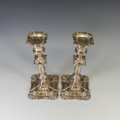 18 - A pair of Elizabeth II silver Candlesticks, by Barker Ellis Silver Co., hallmarked 1974/5, fluted kn... 