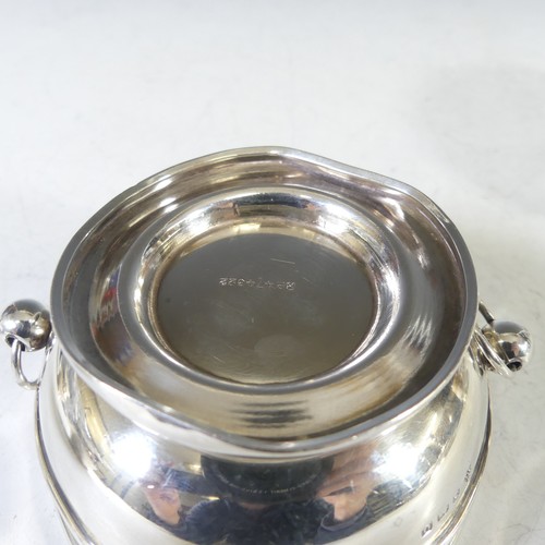 19 - A George V silver Capstan Inkwell, hallmarked Birmingham 1910, makers mark obscured, with hammered d... 