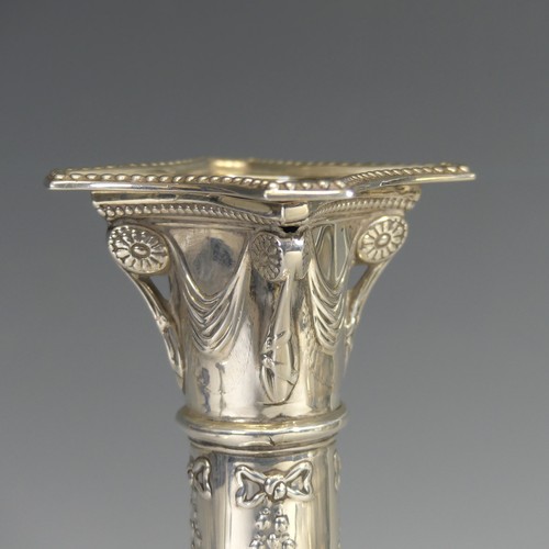 49 - A near pair of silver Column Candlesticks, by Thomas Bradbury & Sons Ltd., hallmarked London 190... 